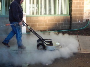 Cleaning Concrete with surface cleaner